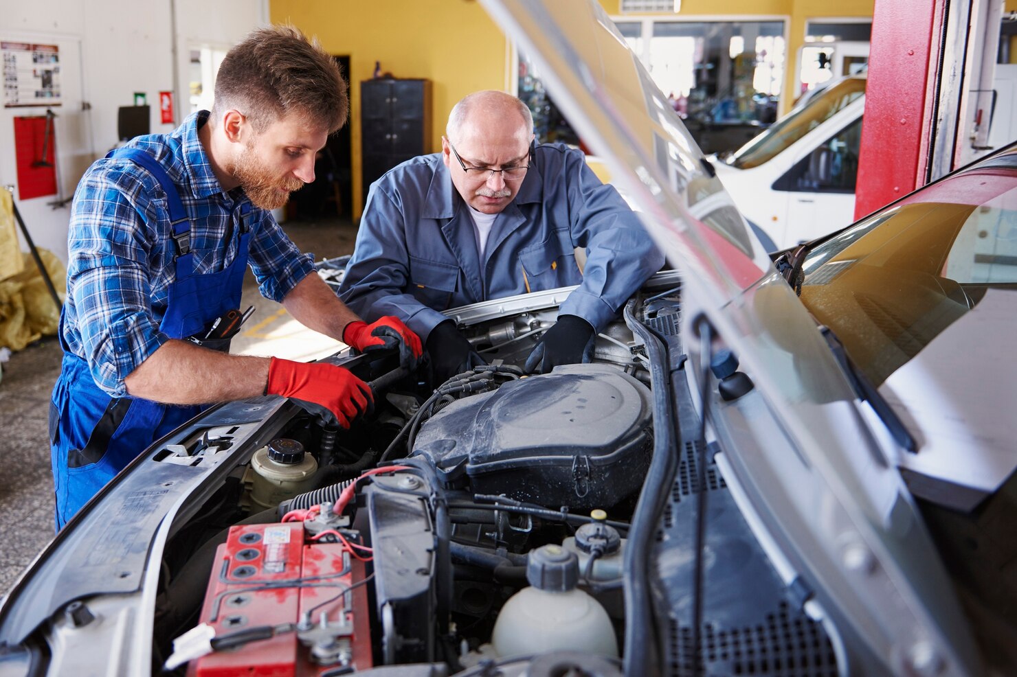 Auto repair specialists performing detailed vehicle engine diagnostics in Bonita Springs, FL